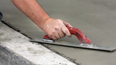 A men with pressing rapid concrete.