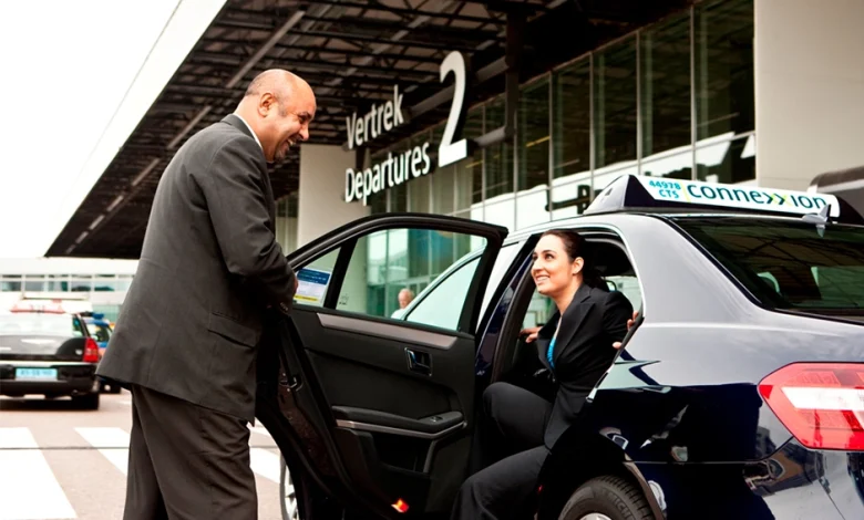 a business lady coming out from car at airport