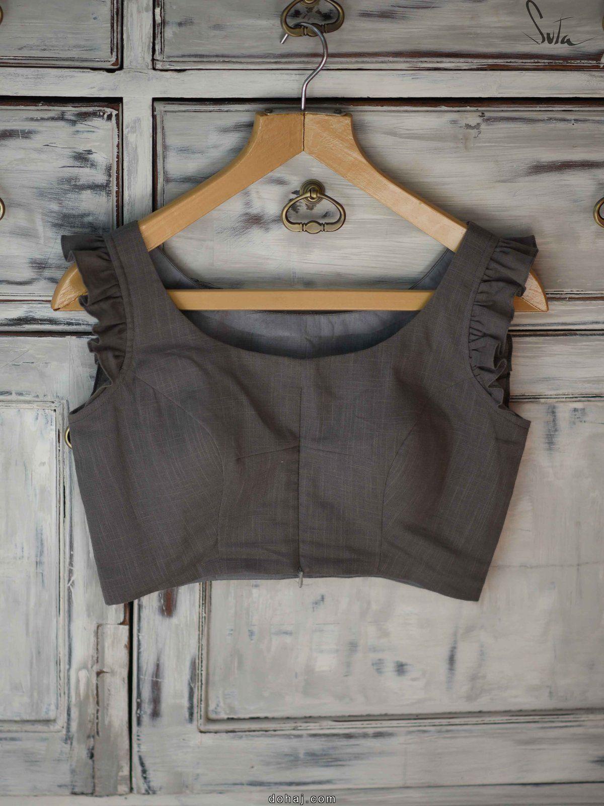 Off White Sleeveless Blouse