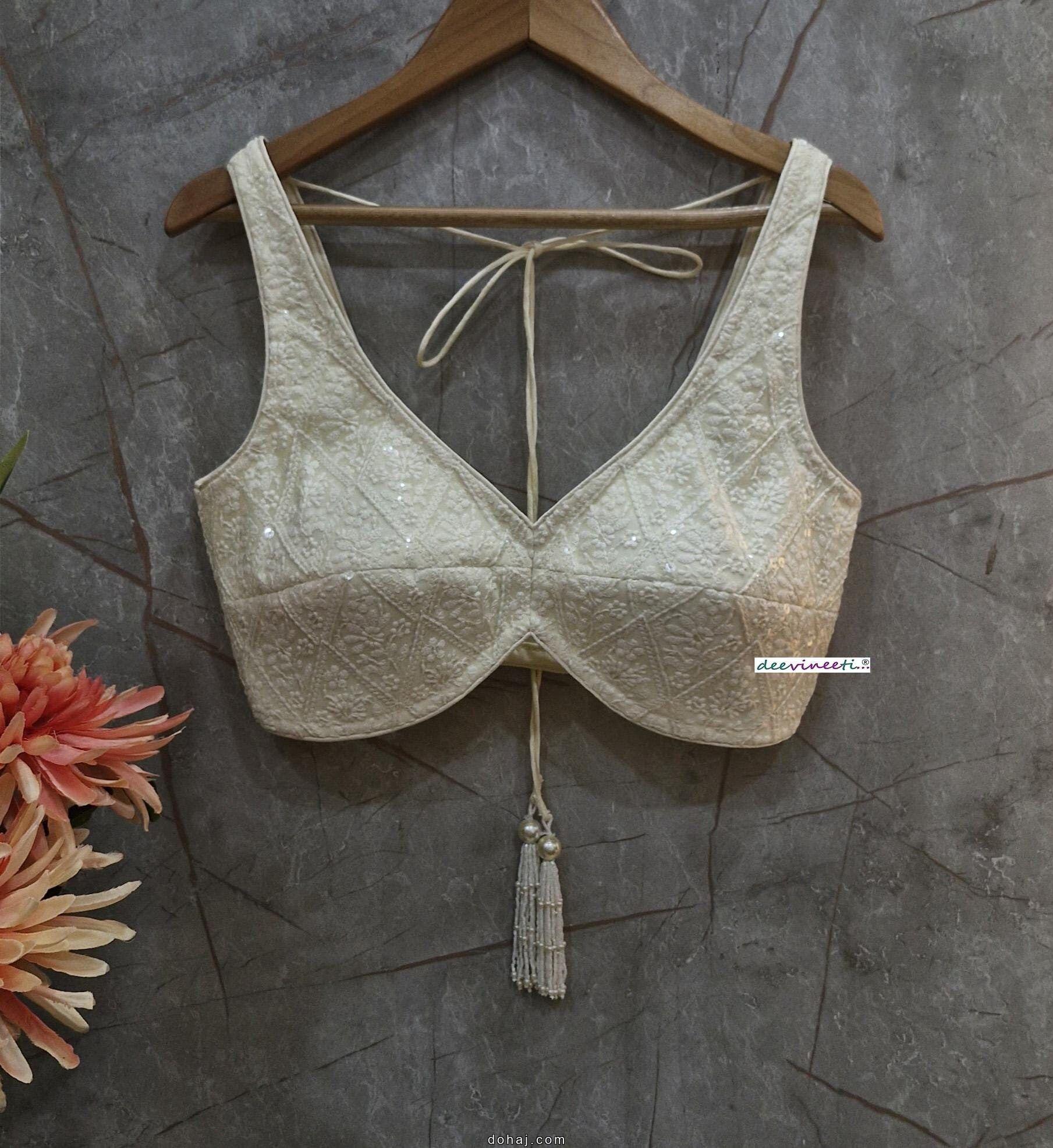 White Sleeveless Blouse